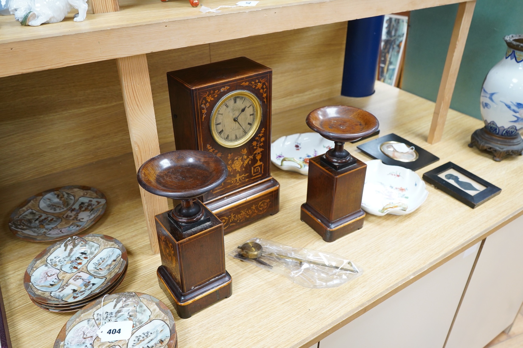 A late 19th century rosewood marquetry clock garniture by Graham, London, 35cm